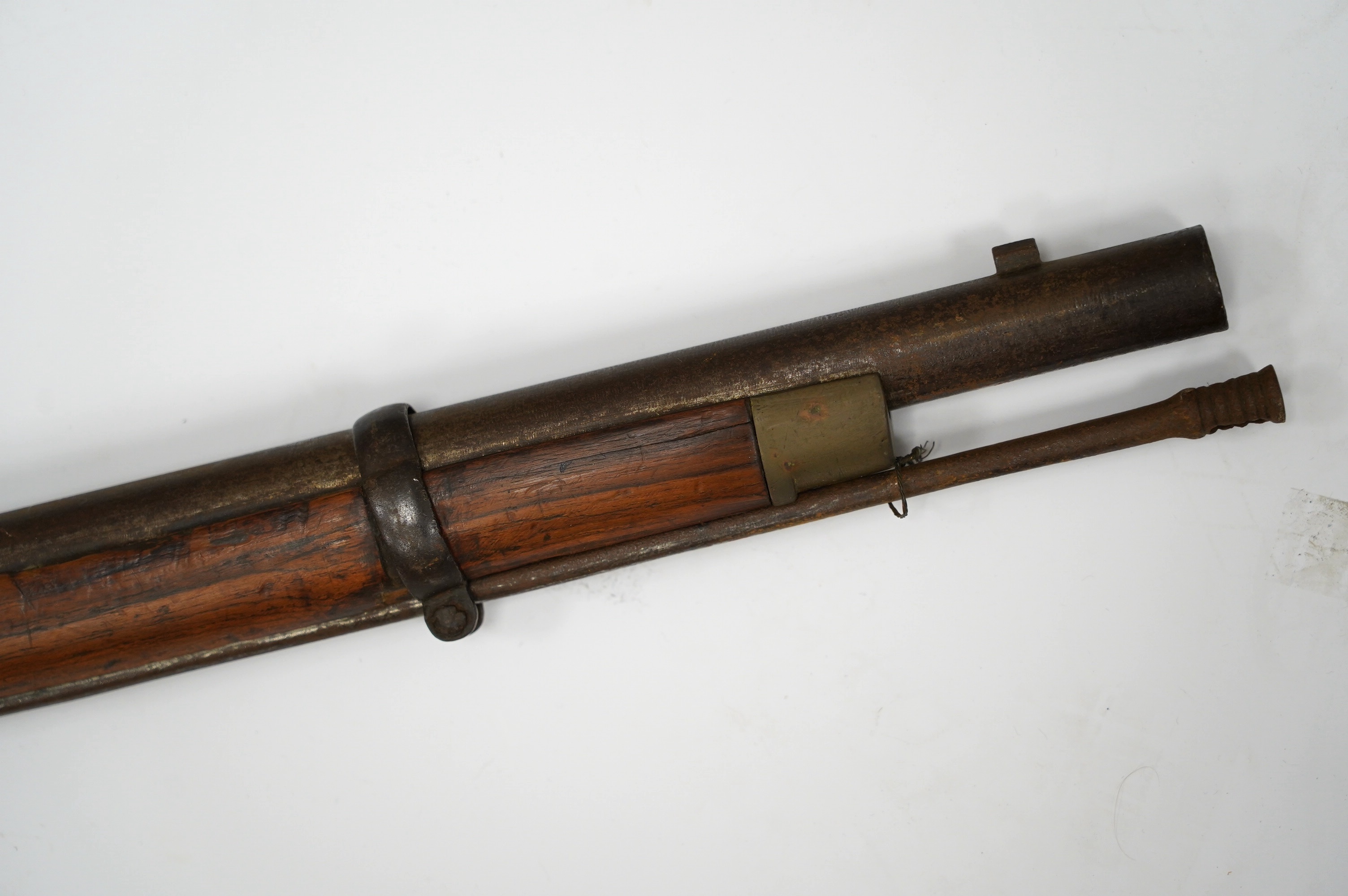 A decorative Indian military three band percussion musket, brass mounts, steel barrel bands and ramrod, barrel 98.5cm. Condition - fair, some age wear overall